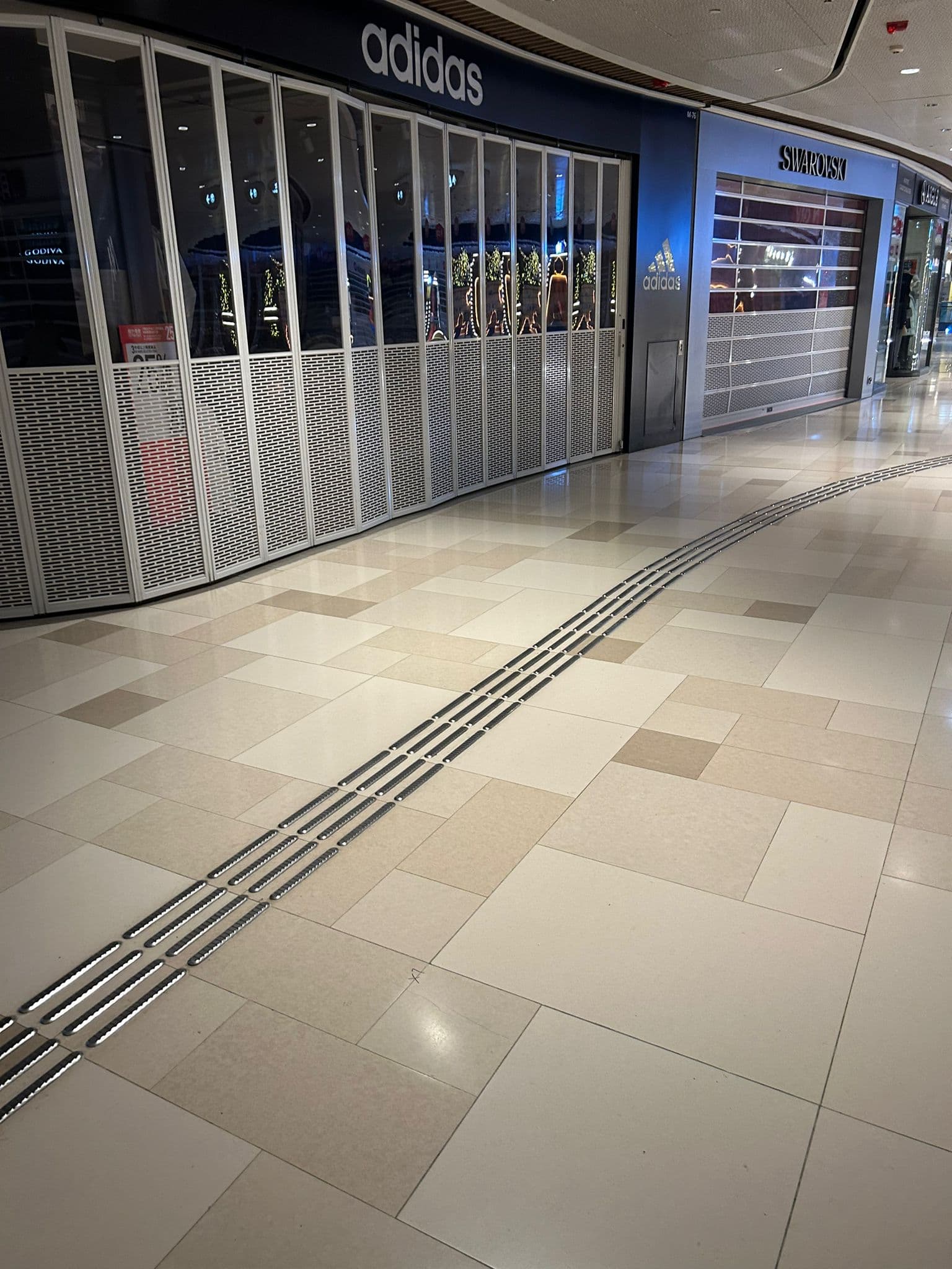 V city — Arcade Area Floor Tile Replacement